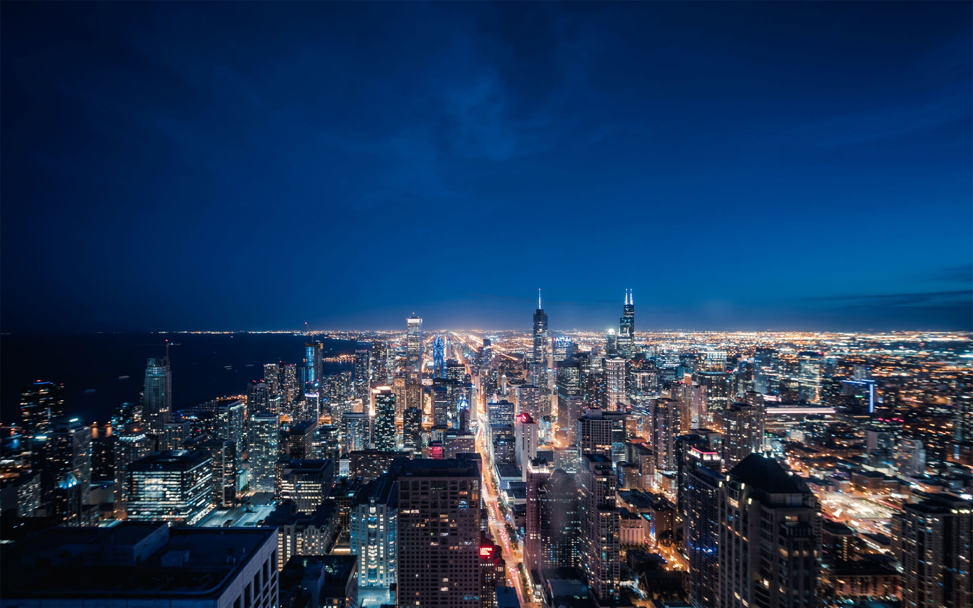 https://greeksalad.eu/storage/2021/01/1160442138-Aerial-View-of-Chicago-cityscape-skyline-at-Night.jpg